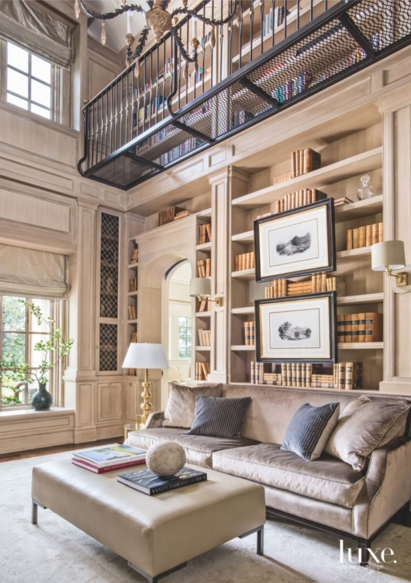 Library 4 white oak panelled double-height with metal upper balconym sofa from Hickory Chair (photo Peter Vitale for Luxe)